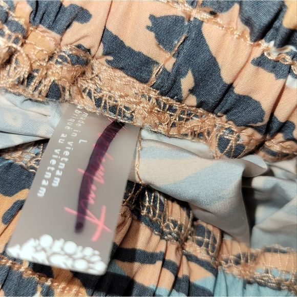 Free People Movement Zephyr Printed Pants Camel Combo Size Large NWOT - Picture 6 of 8